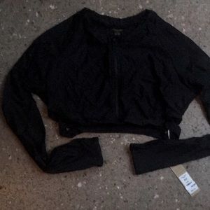 Swim Systems crop top swim top.  Front zipper.  Side cut outs.